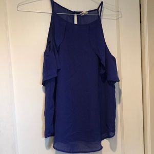 Blue sleeveless ruffled blouse